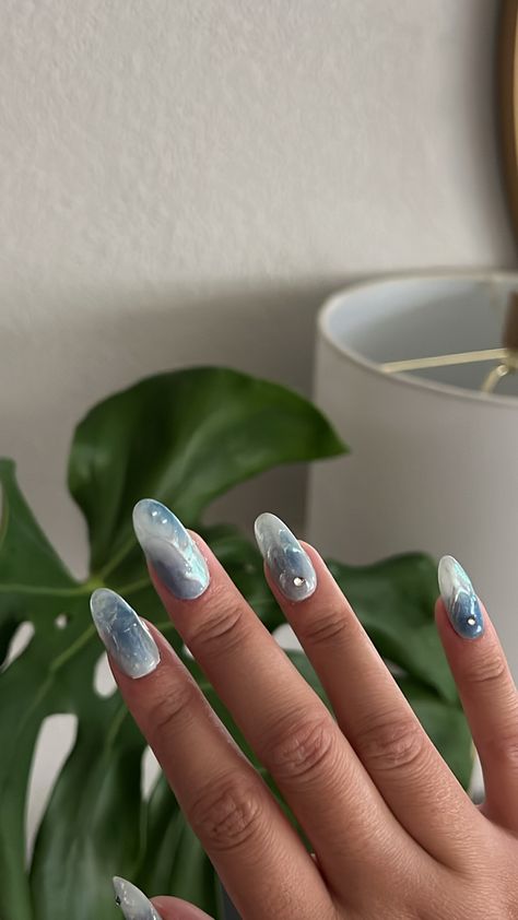 Softgel Nail Design Blue, Blue Avatar Inspired Nails, Daniel Caesar Inspired Nails, Light Blue Abstract Nails, Watery Blue Nails, Pearl And Blue Nails, Avatar Nail Ideas, Avatar Nails Ideas, White And Blue Chrome Nails