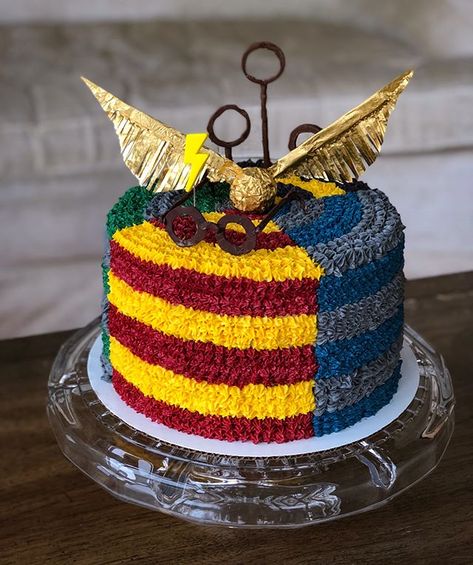 Harry Potter cake idea birthday party, round cake with icing in various house colors magenta for gryffindor, blue for ravenclaw, green for slytherin, yellow for hufflepuff, quidditch and golden snitch topper, no fondant Easy Harry Potter Birthday Cake, Harry Potter Themed Cakes Birthday, Easy Harry Potter Cake Ideas, Harry Potter Cakes Birthday Easy, Harry Potter House Cake, Easy Harry Potter Cake, Harry Potter Cakes Birthday, Hufflepuff Cake, Tarta Harry Potter