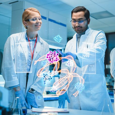 Two scientists looking at a 3D hologram. Nanotechnology, Trends In 2023, Organ Donation, Scientific Discovery, Body Tissues, Michigan State University, Support People, Tech Trends, Michigan State