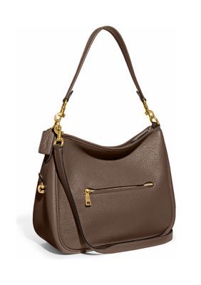 Crafted in soft pebble leather, this bag from COACH can be worn on the shoulder or slung across your body. Inside snap and multi-function pockets Outside zip pocket | COACH Soft Pebble Leather Cary Shoulder Bag Fashion Handbags, Coach Bags, Medium Sized Bags, Coach Crossbody, Coach Crossbody Bag, Designer Shoulder Bags, Coach Leather, Leather Care, Pebbled Leather