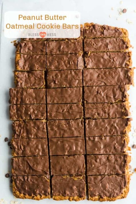 Sheet pan Chocolate Peanut Butter Oatmeal Cookie Bars are rich and soft cookies bars that are prefect for feeding a crowd or enjoying with friends. #cookiebars #peanutbutter #oatmeal #chocolate Pie, Cookie Sheet Cookie Bars, Half Sheet Pan Cookie Bars, Pan Cookies Bars, Oatmeal Peanut Butter Chocolate Chip Bar, Sheet Pan Peanut Butter Cookie Bars, Sheet Pan Cookies For A Crowd, Bar Cookies For A Crowd Sheet Pan, Chocolate Oatmeal Peanut Butter Bars