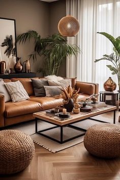 Tan Brown Sofa Living Room Ideas, Lounge Room Ideas Brown Couch, Tan Velvet Sofa Living Room, Modern Organic Living Room Brown Couch, Sagittarius Interior Design, Brown Leather Sofas Living Room Ideas, Couches Color Ideas, Living Room With Tan Leather Sofa, Modern Boho Apartment Decor