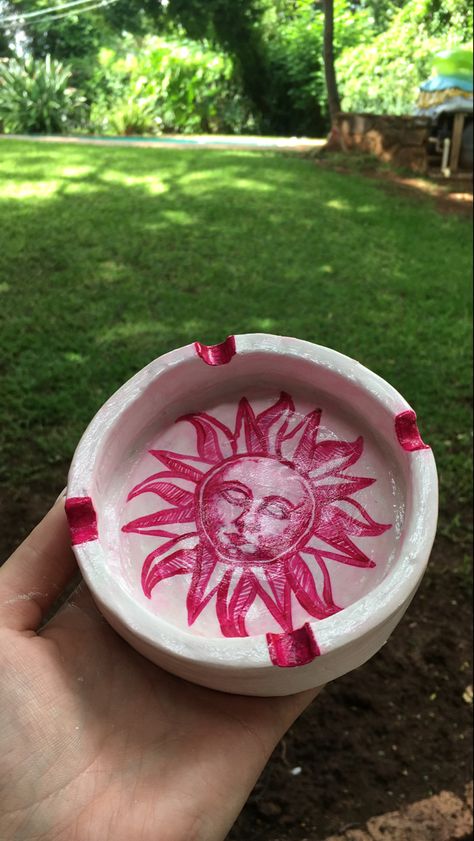 #ashtray #clay #airdryclay #pink #sun #crafts #diy #modgepodge Sun Ashtray Clay, Ash Tray Pottery Ideas, Cute Ash Tray Clay, Diy Ash Trays Clay, Sphere Clay Ideas, Cool Ashtray Ideas, Clay Ash Trays Aesthetic, Cool Ashtrays Diy Clay, Painted Ashtray Diy