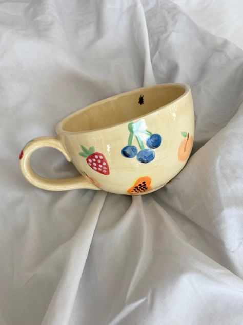 #pottery #painting #paintingpottery #dishitout #matildadjerf #djerfavenue #aestheticfruit Patchwork, Cute Pottery Aesthetic, Pottery Painting Instagram Story, Teacup Pottery Painting, Pottery Painting Ideas Mugs Simple, Painted Mug Aesthetic, Easy Painted Pottery Ideas, Mug Painting Inspiration, Fruit Mug Painting