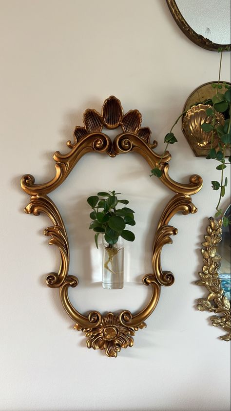 Gold Picture Frame With Plants, Gold Frame Diy Ideas, Vintage Bathroom Gold Mirror, Sage Green Wall Gold Mirror, Picture Frame With Plants, How To Style A Wall Shelf, Gold Frame Wall Mirror, Thrifty Wall Decor, Mirror Wall Decor With Plants