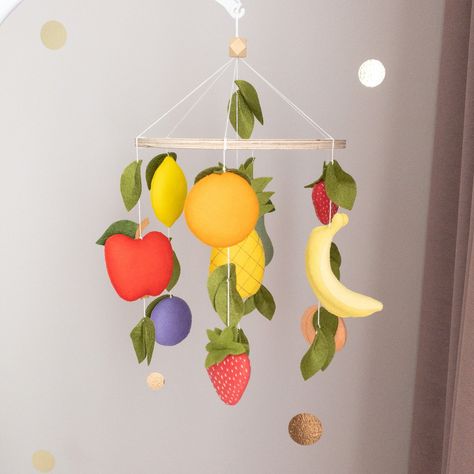 Nursery Fruit Theme, Nursery Ideas Bright, Fruit Themed Nursery, Fruits Character, Fruit Mobile, Leaf Nursery, Fruit Nursery, Felt Mobiles, Hanging Crib Mobile