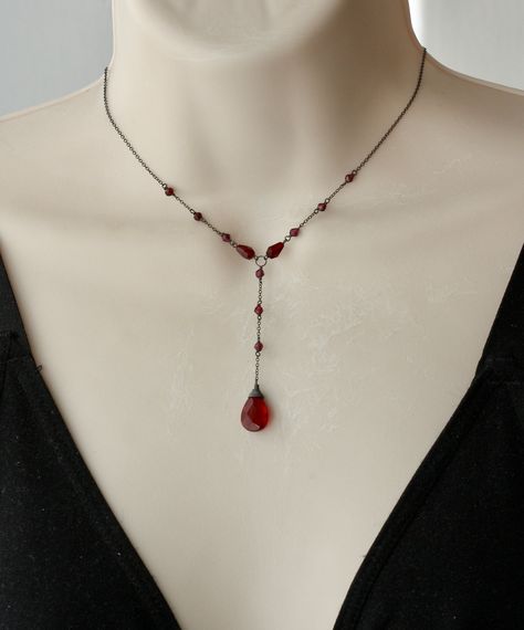 "PLEASE READ THE DESCRIPTION Vintage style, Victorian inspired Y delicate dainty Necklace with Faceted Dark Red Garnet Drop Bead 15 x 10 mm Faceted Garnet Stones 3 x 2 mm. Faceted garnet beads 7 x 4 mm The length of the hanging part is 2.5 inches long Sterling Silver oxidized chain. Closure has Garnet stones and oxidized Sterling Silver Spring Ring Clasp 6 mm. * * * * * * * * * * * * * * * * * * * * * * * * * * * * * * * * * * * * * * * * Your order will be wrapped and shipped in jewelry gift bo Red Vintage Necklace, Antique Garnet Necklace, Dark Feminine Necklace, Black Dress Red Jewelry, Red Drop Necklace, Black Jewelry Necklace Prom, Red Jewelry Prom, Victorian Beaded Necklace, Victorian Inspired Jewelry