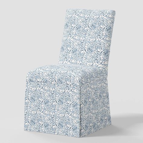 Whether you're eating dinner as a family or hosting guests for a special occasion, the Logan Dining Chair Slipcover from Threshold™ will add a beautiful look to your dining space. This armless dining chair features a slanted back and comes with a floral-print slip cover for appealing style that coordinates well with most of your existing decor. Set on a wooden frame, this 100% cotton dining chair provides a comfy sitting option for enjoying long conversations with loved ones while dining. Thresh Slipcover Dining Chairs, Slip Covered Dining Chairs, Parson Chair Covers, Coastal Dining Chairs, Parsons Chair Slipcovers, Dining Chair Slipcover, Coastal Dining Room, Blue Dining Room Chairs, Parsons Dining Chairs