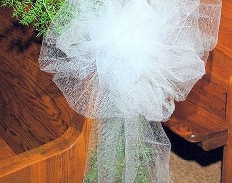 How to easily make wedding bows with tulle- could be really cute, done to scale, for a christmas tree.