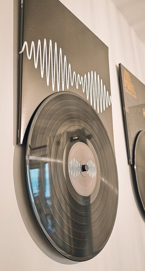 Introducing "Record Roll" - the innovative and stylish way to display your favorite vinyl records on your wall!  Each Record Roll is carefully 3D printed with precision and care, ensuring a high-quality finish that will last for years to come. The Record Roll is designed to hold your vinyl record securely in place. Whether you want to showcase your vintage vinyl collection, or display your favorite new releases, the Record Roll is the perfect choice for any music lover. Not only does the Record Old Album Covers Vinyl Records Wall Art, Records Display Wall, Vinyl Set Up Ideas, Vinyl Record On Wall, Ways To Display Vinyl Records, Vinyl Wall Bedroom, Hanging Vinyls, Music Wall Ideas, Vinyl Record Display Wall Art