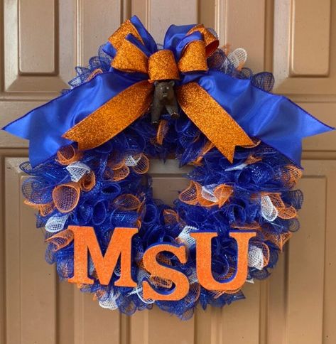 Morgan State wreath, Morgan State University,MSU wreath, Morgan State gift, Morgan State Graduation, Morgan State wreath for work, Morgan St A beautiful Morgan State University wreath to showcase your MSU pride.  This wreath can be displayed either on your dorm room door, on your home or apartment front door, in your office or in your classroom.  It makes for a perfect birthday, holiday or graduation gift or it can be used as a centerpiece for alumni gatherings. Made of deco mesh and wired ribbo