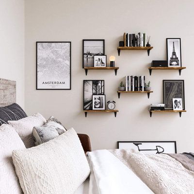 Floating Shelf Records, Minimalist Bedroom Photos, Picture Display Bedroom, Industrial Bedroom Wall Decor, Over Desk Wall Decor Home Office, Hanging Shelf Bedroom, Wall Mounted Shelves Bedroom, Masculine Wall Decor Bedroom, Picture Wall In Bedroom