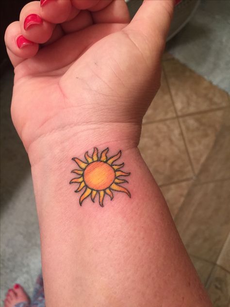 Sun tattoo on wrist with color. You are my sunshine Tiny Sun Tattoo, Simple Sun Tattoo, Design Tatuaje, Sun Tattoo Small, Sunshine Tattoo, Sun Tattoo Designs, Lady Bug Tattoo, Cool Wrist Tattoos, Sun Tattoos