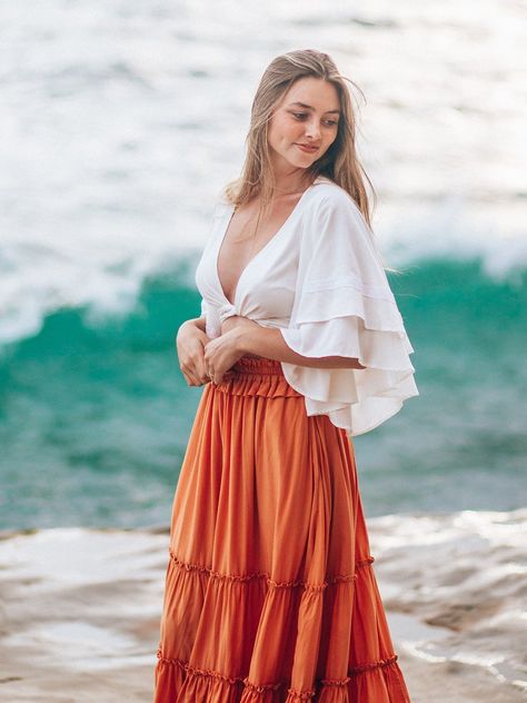 Available in both a cropped silhouette and regular length, our boho-chic wrap top is designed with voluminous flutter sleeves and a double-layered design to create a flowy look. Customize your fit with the long waist ties that can be secured in the front or back. Delicate lace details add a romantic finishing touch. It Crop Top Outfits, Long Sleeve Cropped Top Outfits, Flowy Skirt Outfit, Casual Boho Outfits, Flowy Maxi Skirts, Wrap Crop Tops, Layered Design, Neck Wrap, Flowy Skirt