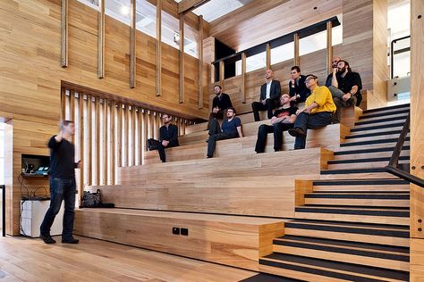 Wooden tiered platforms provide an informal seating zone inside the events space - Decoist Tiered Seating, Office Commercial, Commercial And Office Architecture, Office Pictures, Architectural Practice, Commercial Architecture, Workplace Design, Studio Interior, Architecture Office