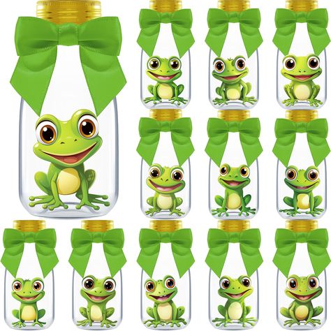 PRICES MAY VARY. INCLUDES: 12 Plastic Bottles, Gold Caps, Ribbons, Frog Stickers, and Thank You Stickers. Each bottle measures 4.00 x 1.80 inches and holds 4 ounces, perfect for creating frog party decorations UNIQUE JARS - Each package comes with 12 unique frog stickers to add a personalized touch to each bottle. Send everyone home feeling appreciative of the extra creativity in your thoughtful keepsakes EASY TO SETUP - These jars are quick to setup in seconds. Just add treats, then place the e Princess And The Frog Party Ideas, Frog Themed Party, Diy Candy Jars, Frog Party Decorations, Frog Baby Showers, Frog Stickers, Frog Party, Unique Jars, Frog Theme