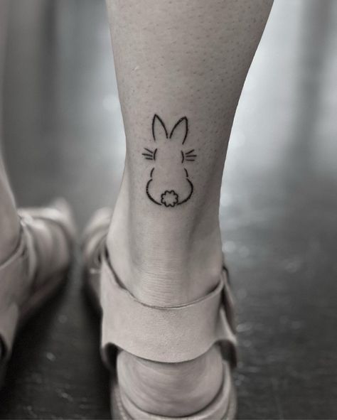 Back of a rabbit tattoo on back of leg Bunny Tiny Tattoo, Cute Bunny Tattoos For Women, Rabbit Tattoos For Women, Rabbit Small Tattoo, Cute Rabbit Tattoo Small, Outline Bunny Tattoo, Tattoo Rabbit Bunny, Bunny Paw Print Tattoo, Bunny Small Tattoo