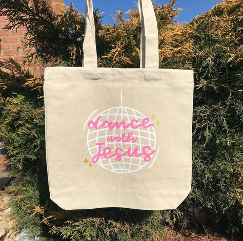 christian tote bags for summer - cute designs that help start conversations about Jesus!! 🩷🫶 get 20% off in my Etsy shop (that includes tote bags!!) through 4/29 🛒💖 click the link in my bio to shop! 🫶 •••••••••••••••• #christian #christiangirl #christianliving #christiantotebags #bible #biblejournaling #biblejournalingcommunity #christianwomen #christianwomencommunity #giftsformom #christianapparel #biblejournalinglife Painted Bible Bag, Painting On Canvas Tote Bags, Painting Bible Bags, Diy Tote Bag Painting Ideas Bible, Bible Bag Painting, Painting Canvas Tote Bags, Christian Tote Bags Paint, Jesus Tote Bag Painting Ideas, Painted Canvas Bags Ideas