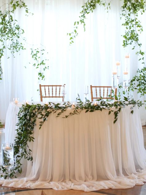 Sweetheart Table | Simply Elegant Leon, Sweetheart Table Candle Decor, Bohemian Sweetheart Table, Minimalist Sweetheart Table Wedding, Wildflower Wedding Sweetheart Table, Whimsical Sweetheart Table, Sweetheart Table Wedding Greenery, Bride And Groom Table Ideas Simple, Small Sweetheart Table