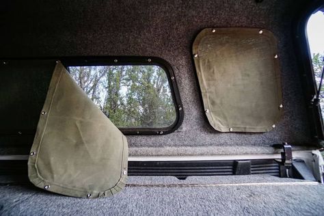 One of the cheapest ways to travel on your own is sleeping in the back of your truck. For safety and protection from the elements, having a truck cap, topper, or shell is advisable. Diy Privacy Window, Rv Window Treatments, Rv Window Shades, Truck Topper Camping, Truck Cap Camping, Truck Shells, Pickup Camping, Rv Windows, Camper Windows