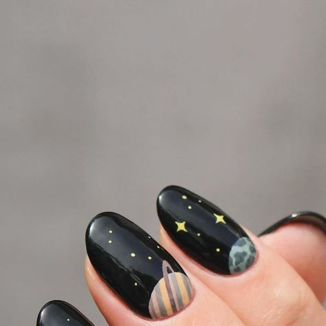 Eva on Instagram: "When in doubt, I bring the planets out. It’s no secret that planet/space manis are my favorite and I’ve done many planet manis over the years. I’ve never done a half moon planet mani, (only actual half moons🌛) so I thought that would be fun!  AND I did both hands! When I do, I only do my other thumb but never a full mani, but this just called for it so I could get all the planets in. (I did want to show a pic of this, but the pictures of it turned out so bad, and my right hand really isn’t all that pretty.)  Really love how it turned out🪐🌍" Space Inspired Nails, Solar System Nails, Moon Design Nails, Space Themed Nails, Planet Nail Art, Neutral Nail Art Designs, All The Planets, Neutral Nail Art, Planet Nails