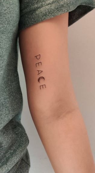 55 Peace Tattoos | Ideas, Designs & Pictures - Tattoo Me Now Love Peace And Happiness Tattoos, Protect Your Peace Tattoos For Women, Peace And Love Tattoo Ideas, Tattoo About Peace, Peace Within Tattoo, Small Peace Tattoo, Peace Tattoo Word, Inner Peace Tattoos For Women, Tattoo Ideas Peace