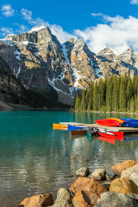 “Its waters are the most amazing colour, a vivid shade of turquoise that changes in intensity through the summer as the glaciers melt. Set in the rugged Valley of the Ten Peaks, Moraine Lake is surrounded by mountains, waterfalls, and rock piles, creating a scene so stunning it almost seems unreal. It’s an iconically jaw-dropping place that is sure to leave a lasting impression.” - Banff & Lake Louise Tourism 📸: Andy Holmes #travel #traveldestination #aesthetic #Traveltips Travel Itinerary Planner, Itinerary Planner, Dream Dream, Moraine Lake, Puzzle For Adults, Lake Sunset, Lake Louise, Canadian Rockies, Famous Places