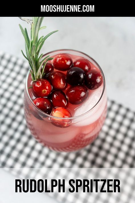 Drink with cranberries on top and rosemary out of the glass on a grey plaid napkin on a concrete back drop. Cranberry Ginger Ale, Bacardi Rum, Holiday Punch, Holiday Drink, Non Alcoholic Cocktails, Alcoholic Cocktails, Christmas Cocktail, Rum Drinks, Holiday Cocktail