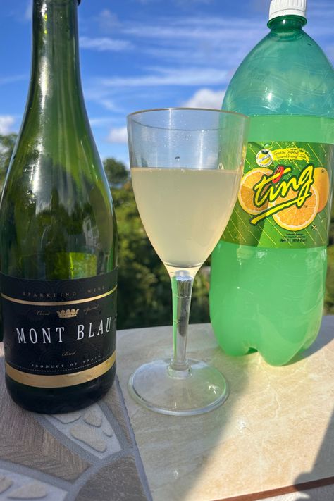 A JAMAICAN CHRISTMAS TING MIMOSA Ting Soda, Jamaican Drinks, Hosting A Christmas Party, Wine Ice Cubes, Classic Mimosa, New Year's Drinks, Foodies Recipes, Cocktail Umbrellas, Jamaican Culture