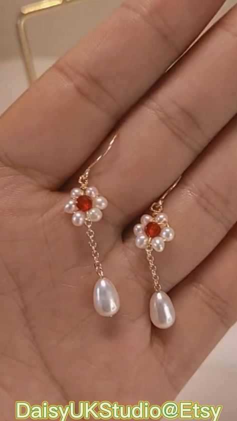 Handmade pearl earrings in 2022 | Handmade jewelry tutorials, Bridal jewelry diy, Diy jewelry videos Handmade Pearl Earrings, Diy Jewelry Videos, Anting Manik, Jewelry Videos, Earrings Diy Handmade, Diy Earrings Easy, Diy Wire Earrings, Diy Jewelry Earrings, Diy Jewelry Unique