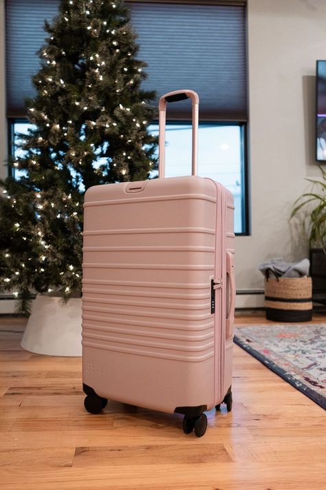 Is Beis luggage worth the hype? After traveling with the popular suitcase, I'm giving an honest Beis luggage review to help you decide.  pink Beis suitcases, pink hard shell luggage, best checked suitcases, best carry on suitcases, cute luggage brands, where to buy luggage, inexpensive luggage brands Beis Luggage, Girls Luggage, Hard Sided Luggage, Cute Suitcases, Hard Shell Luggage, Cute Luggage, Luggage Brands, Classic Girl, Travel Brand