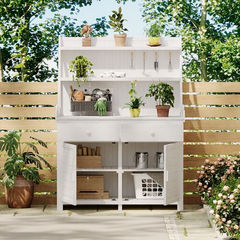 This versatile garden potting bench is an ideal outdoor work station, especially for garden enthusiasts and green thumbs. The long table is 65 inches long and provides a spacious work space, allowing you to easily carry out garden potting, green plant maintenance and other activities. Equipped with storage shelves, drawers, and cabinets, the table provides you with ample storage space for tools, potting supplies, and other essentials to keep your work more organized. Specifications Material: Fir Garden Potting Bench, Outdoor Potting Bench, Potting Tables, Potting Table, Wooden Patios, Potting Bench, Patio Furniture Covers, Three Tier, Fir Wood