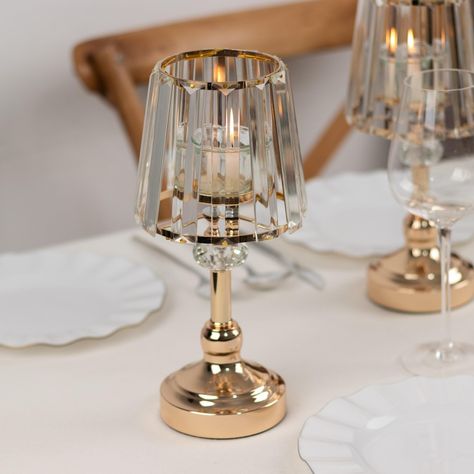 PRICES MAY VARY. Quantity: Set of 2 Candle Holders Material: Metal | Glass Color: Gold and Clear Overall Size: 11" H x 5.25" W Base Size: 4" Dia. Top Opening: 3.5" Dia. Candle Cup Size: 2.5" Dia Glass Lamp Shade Size: 4.5" Dia. Features: Stylish, Beautifully Crafted, Lightweight, Polished, Sturdy Base HIGH QUALITY: These candle holders are made from high-quality premium material. To make things swankier, we have designed it on the master of luster. This elegantly shimmering piece comprises shiny Stained Glass Centerpieces, Pearl Table Decor, Lamp Centerpieces, Clear Glass Lamp, Pillar Candle Stand, Clear Glass Lamps, 2 Candle, Unique Candle Holders, Gold Candle Holders