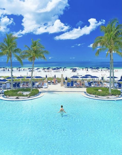 Victoria Yore in the pool with a beach view in the background at the Ritz-Carlton, Sarasota, one of the luxurious resort hotels in Florida. Beautiful Honeymoon Places, Florida Beach Resorts, Florida Vacation Spots, Florida Beaches Vacation, Best Beach In Florida, Florida Travel Destinations, Luxurious Resort, Road Trip Places, Honeymoon Places