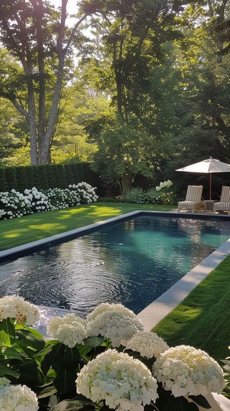 Colonial Pool Design, French Pool Landscaping, Classic Home Renovation, Pool And Garden Backyard, Pool Wooded Backyard, Country Pool Landscaping Ideas, Cottage Backyard With Pool, Soake Pool Landscaping, Hampton Pool Area