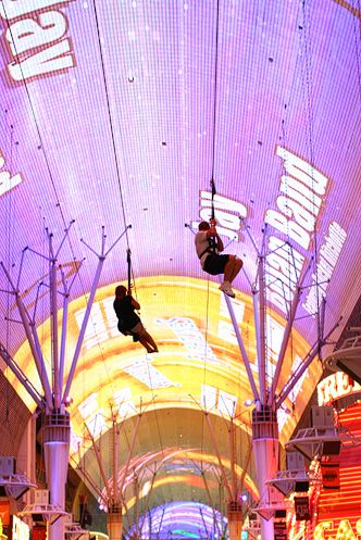 From what we hear, the incredibly popular downtown Las Vegas “zip line” will soon become a permanent part of the Fremont Street Experience. How do we know the zip line is incredibly popular? First, buzz. Second, our relatively lame video of the zip line has gotten more than 16,000 views on YouTube. Yeah, it’s popular..... Freemont Street, Downtown Vegas, Vegas Activities, Kat Diy, Street Pics, Vegas Birthday, Girls Trips, Vegas Fun, Las Vegas Vacation