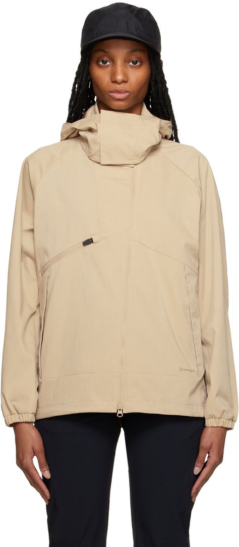 Polyester- and aramid-blend ripstop jacket. Fire-resistant and quick-drying. · Drawstring at detachable hood · Stand collar · Zip closure · Zip and welt pockets · Logo embroidered at front hem · Concealed drawstring at hem · Elasticized cuffs · Vent at back · Full mesh lining Supplier color: Beige Soft Shell Jacket Women, Golf Jacket, Golf Jackets, Snow Peak, Wind Jacket, Training Clothes, Soft Shell Jacket, Shell Jacket, Detachable Hood