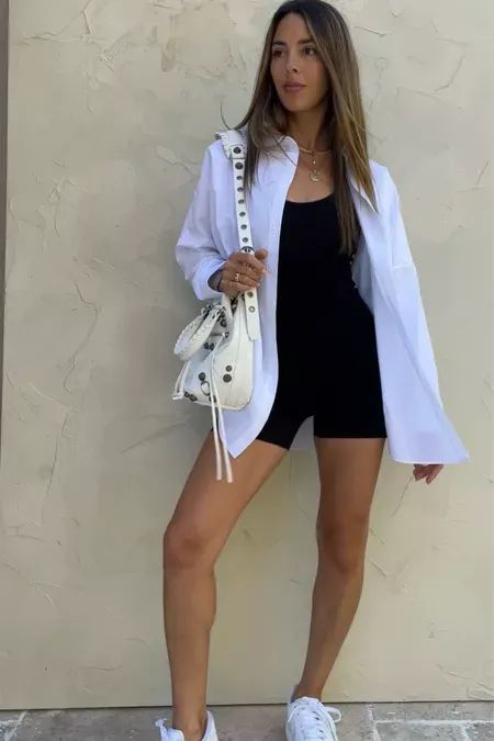 Romper And Shirt Outfit, Romper With Button Down Shirt, Bodysuit With Oversized Shirt, Black Romper With Tights, White Button Down Biker Shorts, White Button Down Casual Outfit, Biker Shorts And White Button Up, White Romper Outfit Casual, Romper And Jacket Outfit