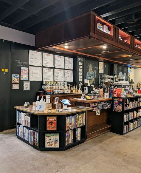 How-To Spielbound | Spielbound Board Game Cafe Game Store Interior Design, Tabletop Game Store, Game Cafe Design Interior, Board Game Shop, Book Shop Design Interior, Boardgame Cafe Design, Board Game Cafe Interior, Coffee Book Store, Board Game Cafe Design