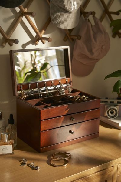 Store your twinkling treasures with vintage-inspired style in this wooden jewelry box from Mele and Co Crafted from wood with suede lining, its lidded silhouette opens to reveal a variety of storage solutions, including a full interior mirror, a seven-hook necklace drop, 6 small compartments and a row of ring rolls. Complete with two spacious drawers and silver-tone drawer pulls. Features. Wooden jewelry box from Mele and Co Crafted from wood with suede lining Lidded silhouette Full interior mir Jewlery Storage, Wall Molding Design, Jewelry Box Makeover, Jewlery Box, Travel Jewelry Box, Jewelery Box, Wall Molding, Vintage Jewelry Box, Wood Jewelry Box