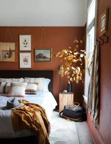 12 Colors That Go With Rust | Hunker Terra Cotta Room Color, Terracotta Blue Bedroom, Terra Cotta Bedroom Ideas, Mustard Bedding Ideas, Terracotta Bedroom Walls, Terra Cotta Color Scheme, Terra Cotta Room, Brown Walls Bedroom, Terra Cotta Wall Color