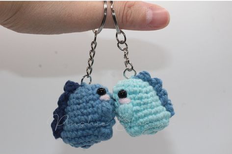 IMPORTANT: EACH PURCHASE IS SOLD IN PAIRS!  This Cute Chubby Dino Amigurumi  Keychain is the perfect addition to any dinosaur lover's collection. Handmade with love, this keychain is a great way to show off your love for dinos while on the go. Kissing Dino Keychain: This cute plushie features two dinos sharing a kiss, making it an adorable and unique gift for Valentine's Day or any romantic occasion. Best Friend Gift: Show your BFF how much they mean to you with this charming keychain that can be attached to bags or keys. Whether you're looking for a cute bag accessory or an adorable charm, this Chubby Dino Amigurumi Plushie has got you covered. Order now and get ready to fall in love! WARNING:  May contain potential choking hazard for children under the age of 3! SOCIAL MEDIA: Instagram a Amigurumi Patterns, Couple Crochet Gifts, Crochet Couple Keychain, Couple Dino, Matching Keychains Couples, Dino Keychain, Cute Best Friend Gifts, Valentine Day Kiss, Couples Keychains