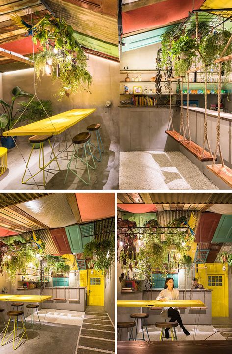 Q&A Architecture Design Research have designed Barraco, a new bar in Shanghai, China, that features recycled materials, swings and a hanging table. #BarDesign #InteriorDesign Hanging Bar Table, Tropical Hostel, Tropical Cafe Design, Recycled Interior Design, Recycle Design, Hostels Design, Cafe Concept, Warehouse Design, Hanging Table
