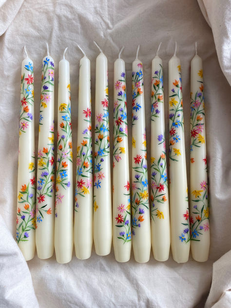 floral hand painted dinner candles Hand Painting Candles, Candlestick Painting Ideas, Taper Candles Painted, Floral Painted Candles, Painted Candle Designs, Candel Painting Idea, Hand Painted Candle Sticks, Painted Candle Ideas, Diy Painted Candles