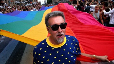 Gilbert Baker with the iconic rainbow coloured flag on a march in 2003 Gilbert Baker, Rainbow Flags, Gay Rights Movement, Lgbtq Flag, Rainbow Flag Lgbt, Lgbt History, Gay Rights, Gay Pride Flag, Rainbow Flag Pride