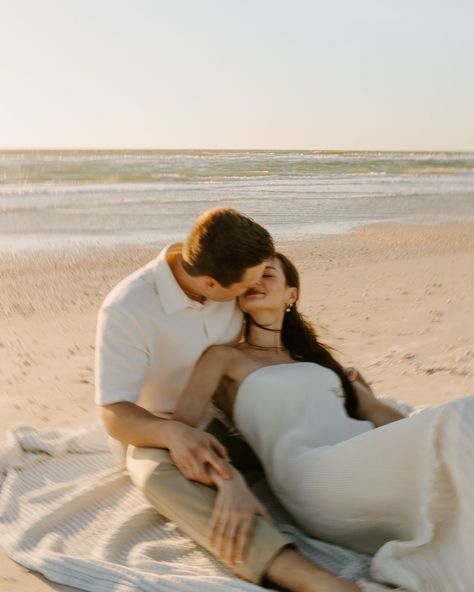 A very windy day turned into one of my fave engagement shoots 💍🌬️ Eric + Abby have the sweetest love and I am so happy I got to document this time for them!! Also isn’t her dress incredible!? There’s something about simplicity that is so elegant!! ✨ [beach engagement, engagement photos, St Pete beach photographer, st Pete photographer, Florida wedding photographer, beach engagement photos, documentary style photos, documentary photography] Aesthetic Couple Pictures At The Beach, Couples Photoshoot Florida, Engagement Shoot On Beach, Engagement Shoot On The Beach, Virginia Beach Engagement Photos, Engagement Poses Beach, Beach Engagement Photos Aesthetic, Engagement Pictures In Water, Beach Engagement Photoshoot Outfit