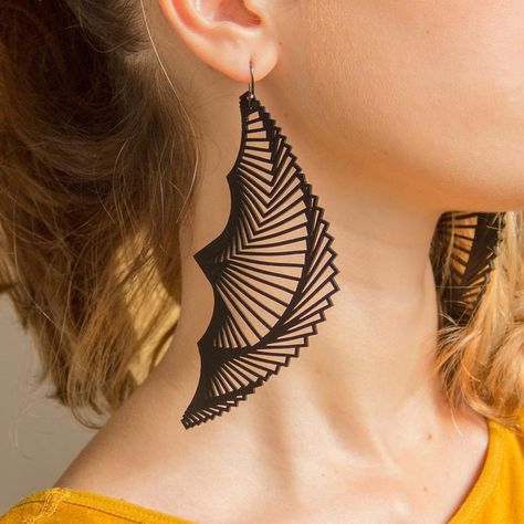 Image may contain: one or more people and closeup Parametric Jewelry, Rubber Earrings, 3d Tiskárna, Weird Jewelry, 3d Printed Jewelry, Contemporary Jewelry Design, Laser Cut Earrings, Printed Jewelry, Recycled Jewelry