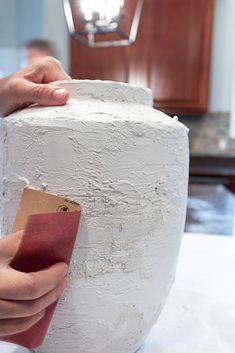 This DIY plaster vase tutorial will give you a high end pottery look on a budget. And get the best tips for working with plaster of paris. Diy Vase Pottery, Plaster Vases Diy, Spackle Diy Vase, Diy Aged Vessel, Plaster Of Paris Planter Diy, How To Make Plastic Pots Look Like Stone, Crafts With Plaster Of Paris, Plaster Of Paris Texture Painting, Diy Plaster Pot