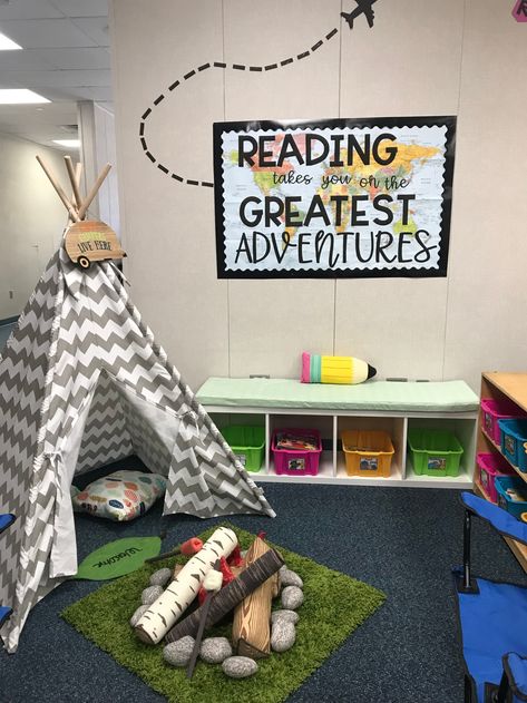 Travel Bulletin Boards Elementary, Let The Adventure Begin Classroom Door, Reading Takes You On Adventures, Camping Reading Corner, Preschool Classroom Reading Corner Ideas, Adventure Theme Classroom Ideas, Outdoor Adventure Classroom Theme, Teacher Reading Corner, Reading Is An Adventure Bulletin Board