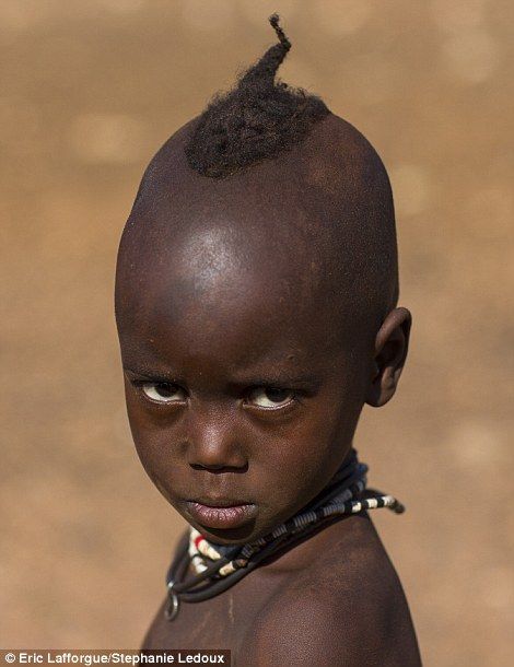 Getting started: This tiny boy's plait is almost as tiny as he is Boys With Black Hair, Himba Tribe, Black Boys Haircuts, Short Hair For Boys, Cute Middle School Outfits, Mens Haircuts Short Hair